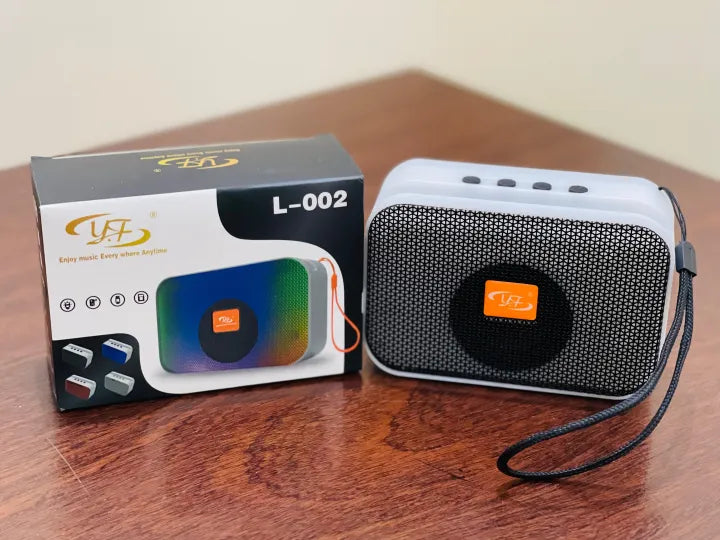 RBG Bluetooth Speaker - TF Card / USB / FM - Rechargable - Hanging Strap - Adjustable Light