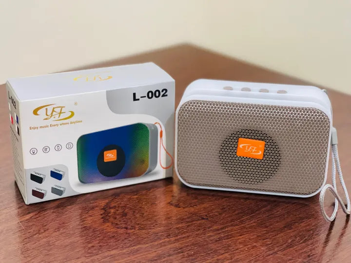 RBG Bluetooth Speaker - TF Card / USB / FM - Rechargable - Hanging Strap - Adjustable Light
